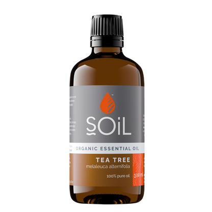 Bottle of Soil Organic Essential Oil Tea Tree on a white background